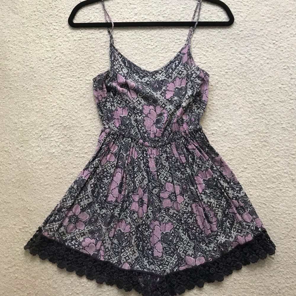 Fun floral LF romper in purple with crochet trim